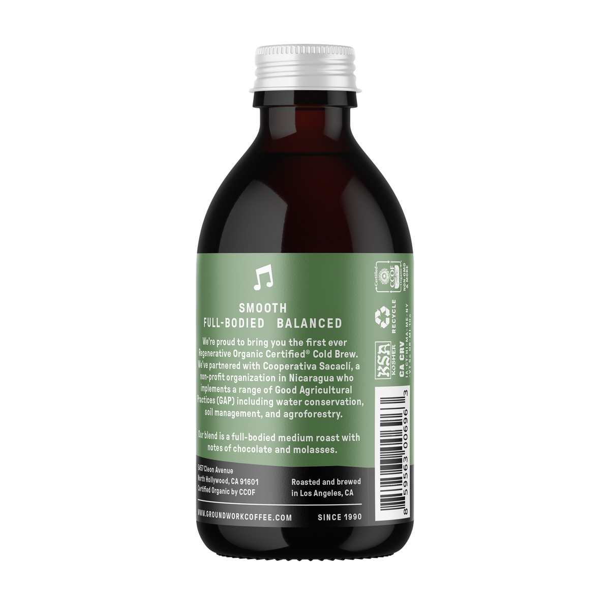 A dark glass bottle with a green label for Groundwork Coffee Co Regenerative Organic Certified® Cold Brew, featuring Smooth, Full-Bodied, Balanced notes and sustainability info.