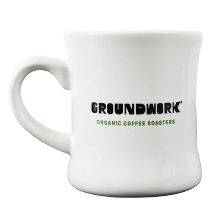 The Groundwork Coffee Classic Diner Mug is a white ceramic mug, microwave and dishwasher safe, with bold black GROUNDWORK and green ORGANIC COFFEE ROASTERS on the front.