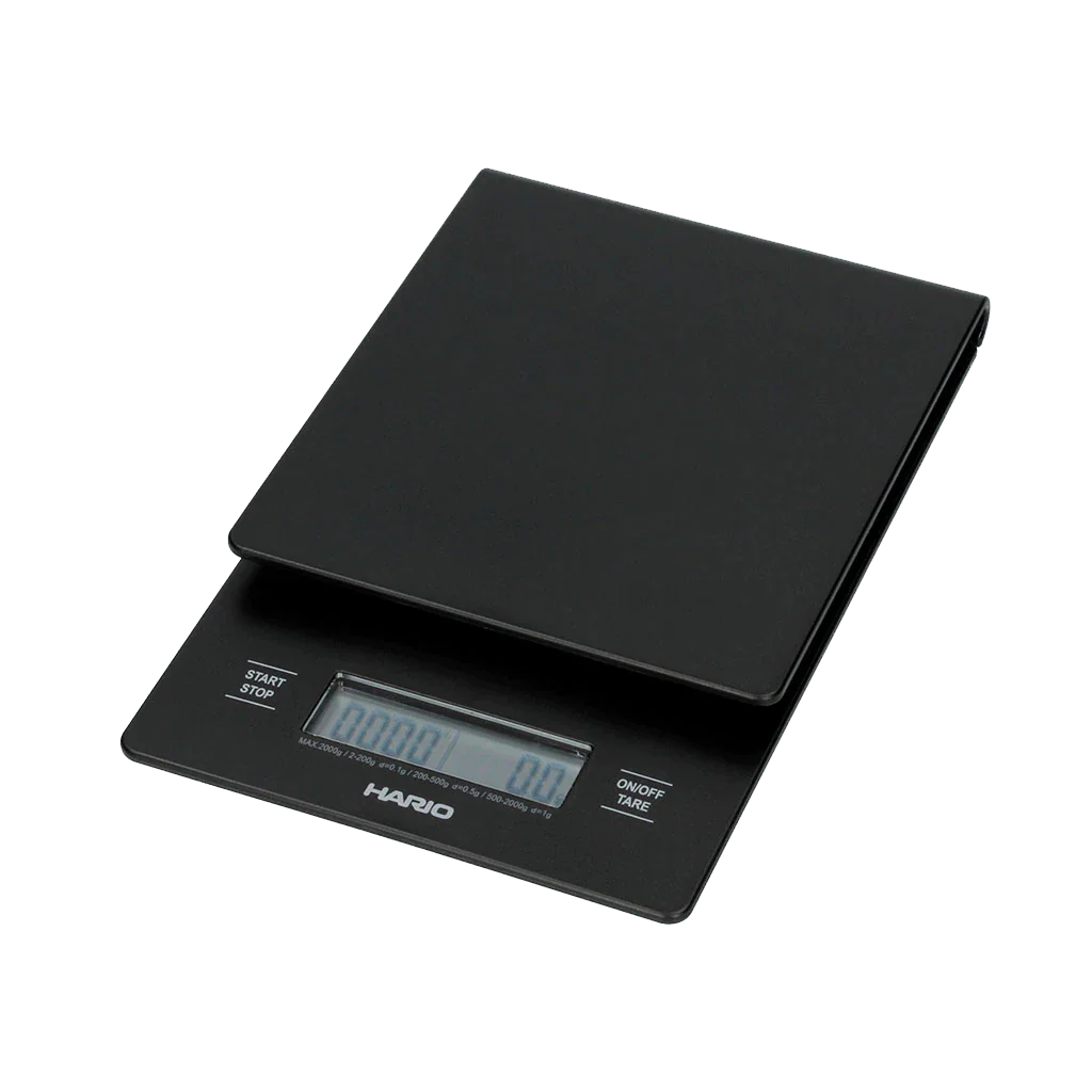 The Groundwork Coffee Hario V60 Drip Scale is a black, rectangular digital scale with LCD display, ideal for pour over coffee and timing your brew.
