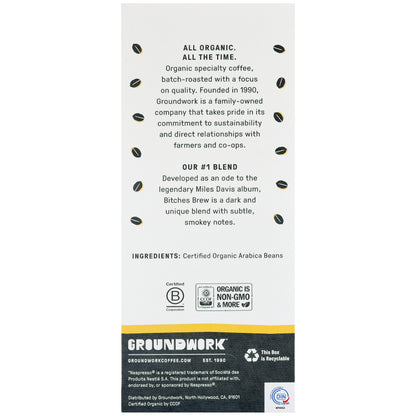 A white package with black text features Groundwork Coffee’s Bitches Brew - Nespresso® dark roast, organic pods, certification logos, and recyclable packaging.