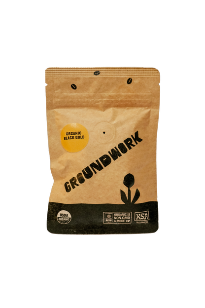 A brown bag of Groundwork Coffees Coffee Sample, featuring USDA Organic and organic non-GMO certification labels.