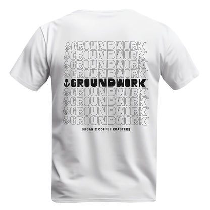 The back of the T-shirt with the word GROUNDWORK repeated twelve times in a centered grid of thin black outlines, with the fifth row printed in solid black next to the flower icon and the words ORGANIC COFFEE ROASTERS printed below.