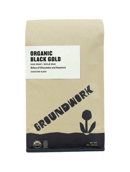 Groundwork Coffee Black Gold whole bean dark roast comes in a brown bag with chocolate and hazelnut notes. Organic, B Corp certified—perfect for chocolate coffee lovers.